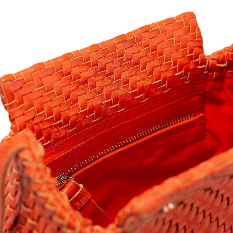 Small orange deals clutch bag